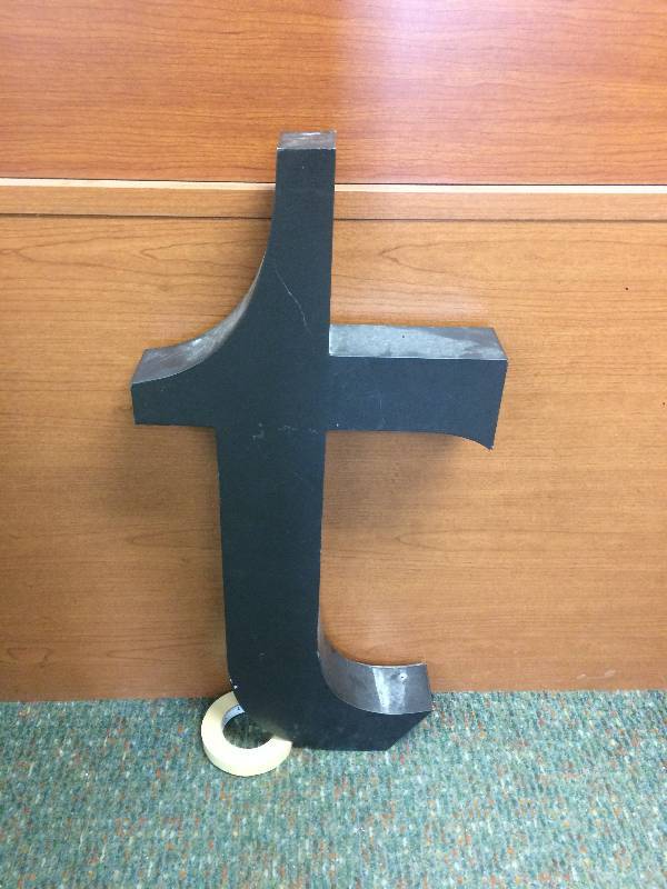 lot 10 image: Graphite Letter T