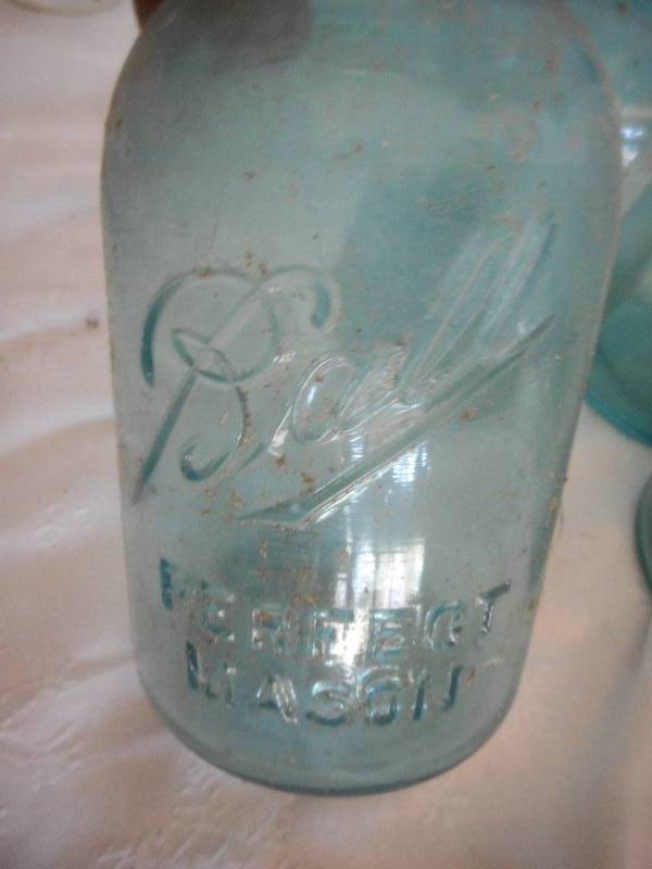 lot 17 image: VINTAGE GREEN BALL JARS
