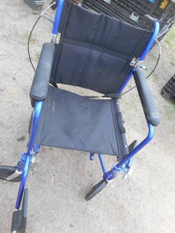 lot 70 image: TRANSFER WHEEL CHAIR