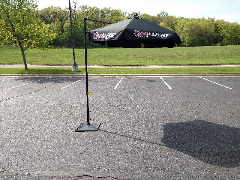 lot 237 image: Coors Light Umbrella with Heavy Wei...