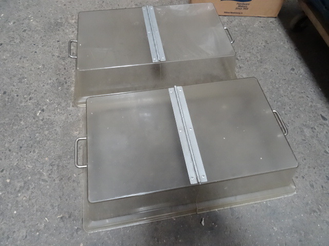 2 full sized pan covers. Hinged lid...
