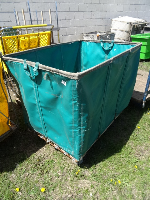 4 wheel laundry cart. 31 x 43 x 36...