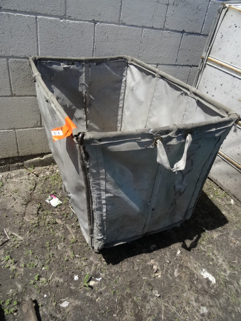 4 wheel laundry cart. 24 x 34 x 29...