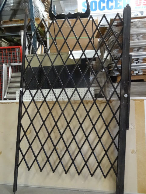 Accordian security gate. 96 tall. ...