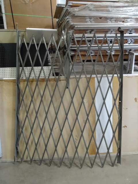 Accordian security gate. 73 tall. ...