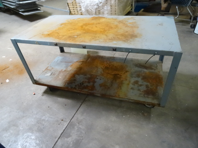 4 wheel metal cart  table. 60 x 30...
