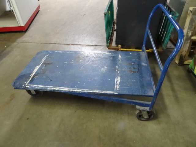 All metal 4 wheel warehouse cart. 3...