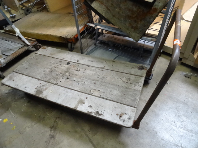 4 wheel shop cart. 31 x 60...