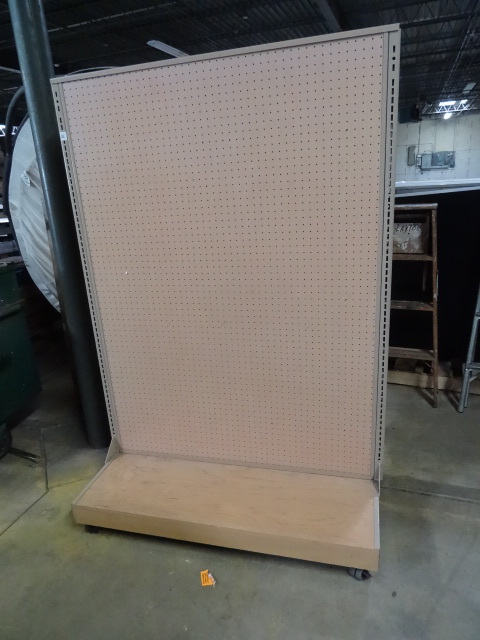 Double sided retail display on whee...