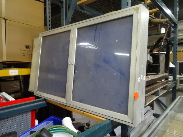 60 x 36 message board. 2 doors. Loc...