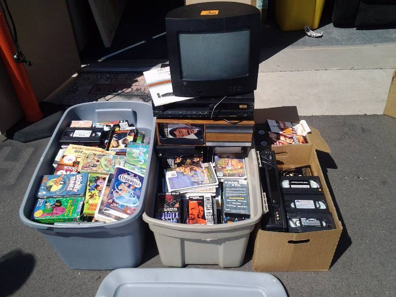 lot 30 image: 4 Large Containers Of VHS, TV & VCR