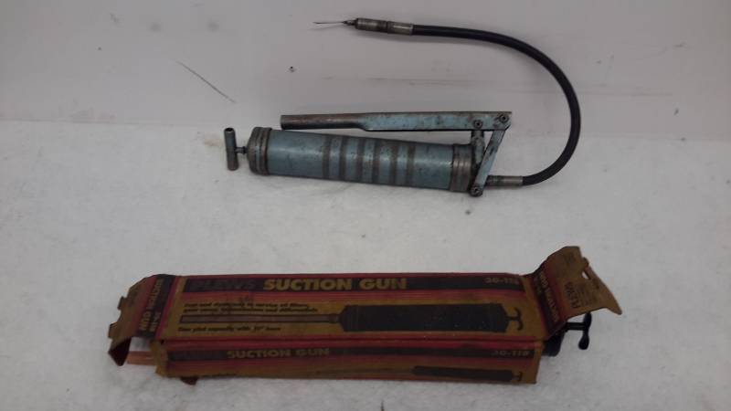 lot 28 image: Suction gun and grease gun