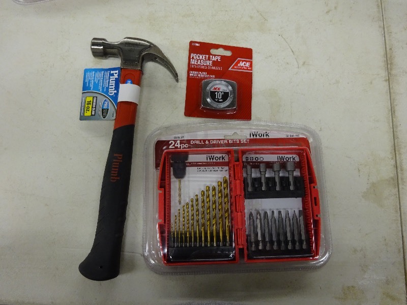 lot 33 image: Plumb hammer 16 oz. pocket tape measure, 24 pc drill and driver buts set