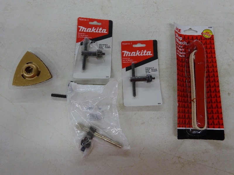lot 68 image: Makita chuck keys, ace strap wrench