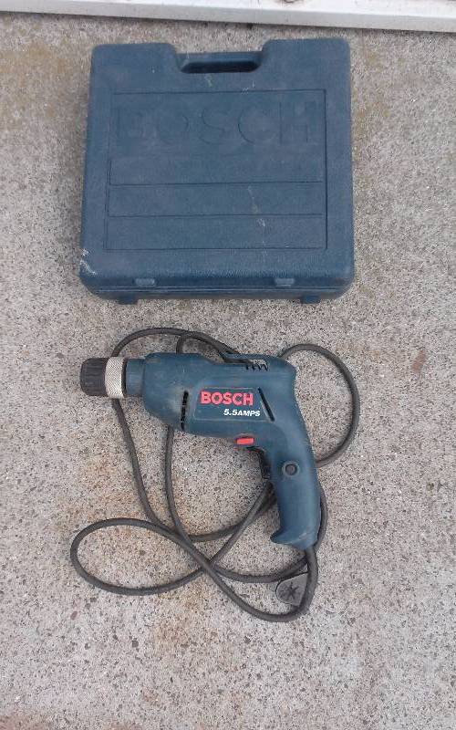 lot 25 image: Bosch Drill in Case