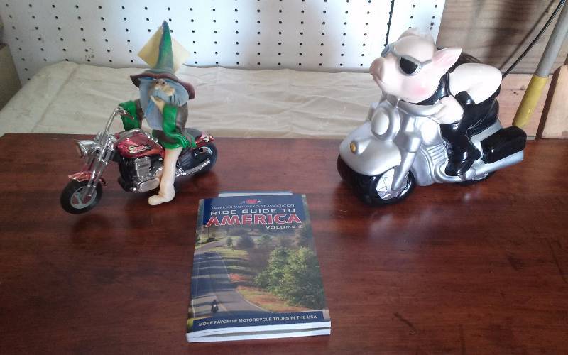 lot 201 image: Pig Riding Motorcycle Cookie Jar, Motorcycle Candle, etc