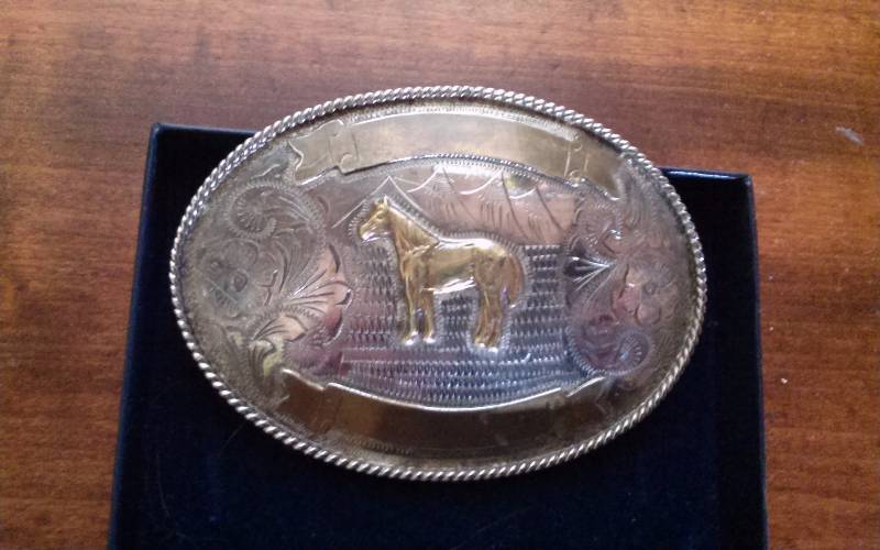 lot 208 image: Belt Buckle - Montana Silversmith Horse Belt Buckle