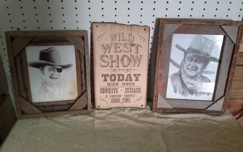 lot 222 image: Lot - John Wayne Prints in Barnwood Frames & Wild West Show Plaque