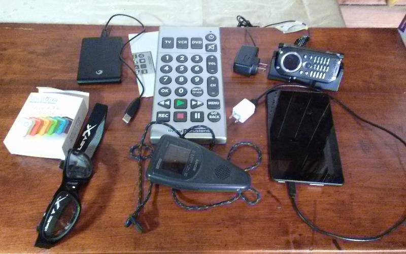 lot 231 image: Lot - Misc Electronics - Amazon Fire Tablet, Verizon GZ One wCharger, Sony Watchman, Etc