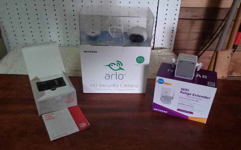 lot 233 image: Lot - Netgear Security Camera, WIFI Extender, Verizon Mobile Hotspot