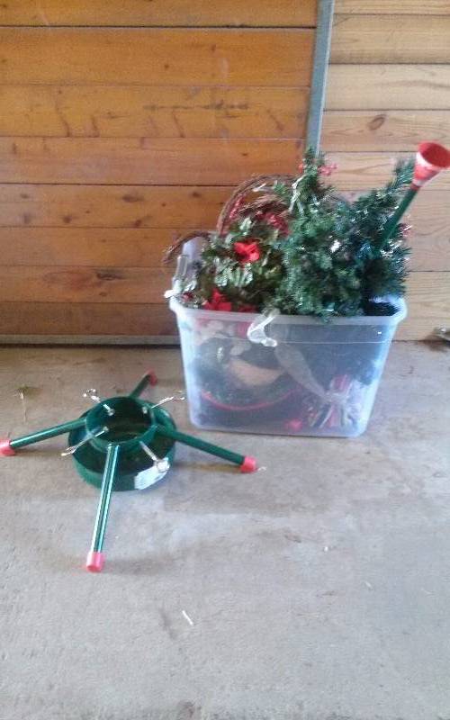 lot 291 image: Lot - Tote with Misc Christmas Dcor & Heavy Duty Metal Tree Stand