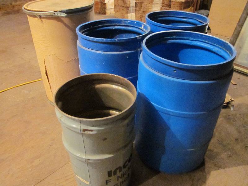 lot 106 image: 3 Blue Plastic Barrels, Metal Barrel, & Cardboard Barrel