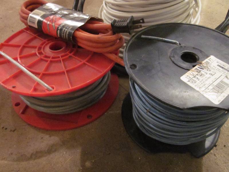 lot 45 image: Bucket of Electrical, 3 Rolls of wire, & 2 Paper Towel Dispensers