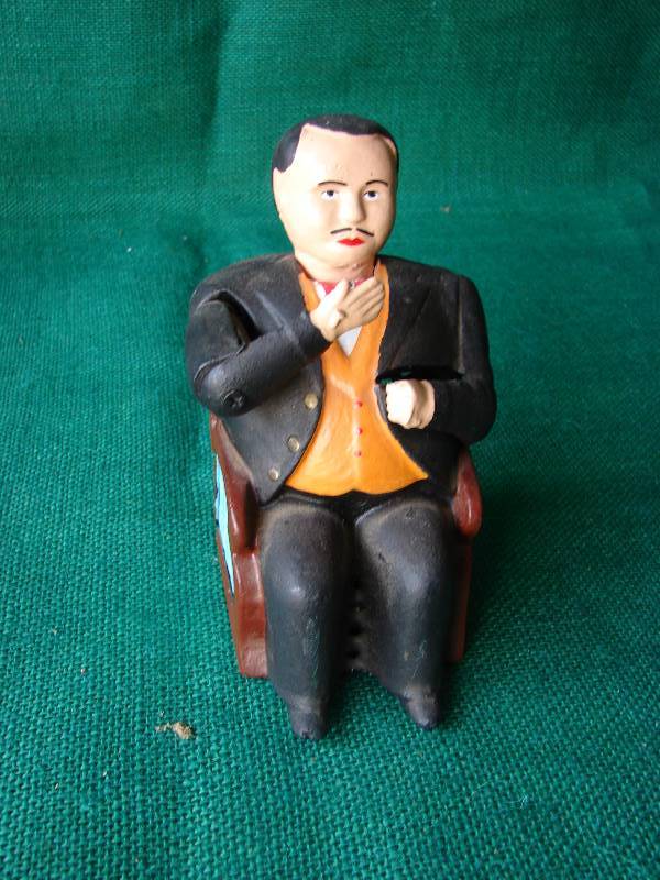 lot 105 image: Antique Tammany Hall figure Tweed Old Nodder Cast ron mechanical bank.