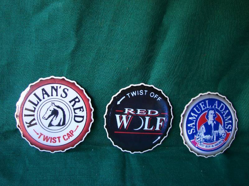 lot 120 image: Beer CAP Advertisements (( Aprox a 11inches across ))