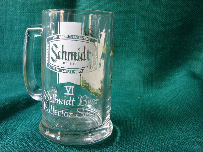 lot 132 image: Vintage Schmidt beer mug ( Collector series ) with fish on other side.