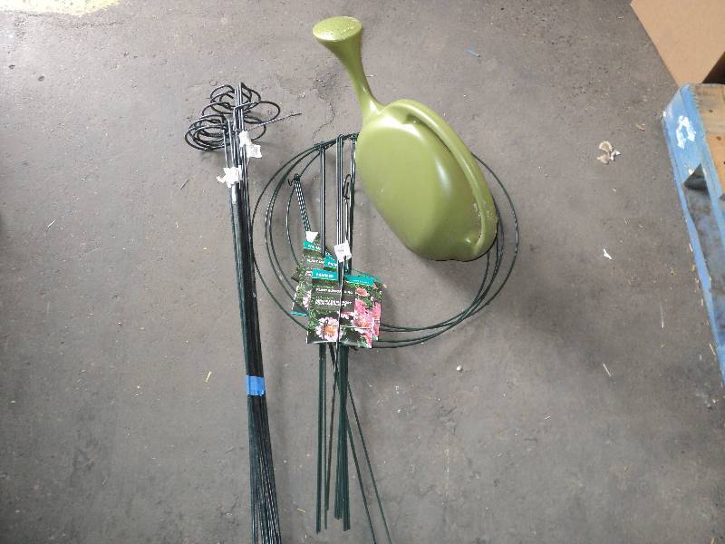 4 plant support rings, 1 watering c...