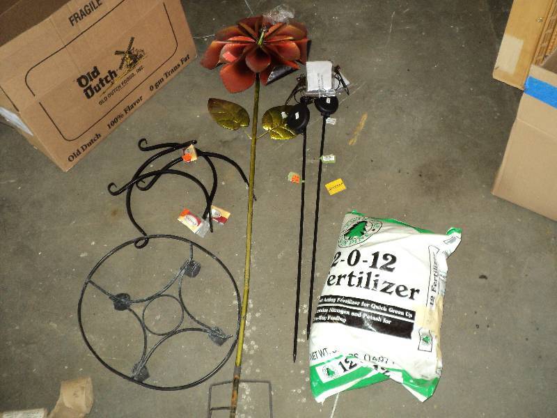 an assortment of damaged garden sup...