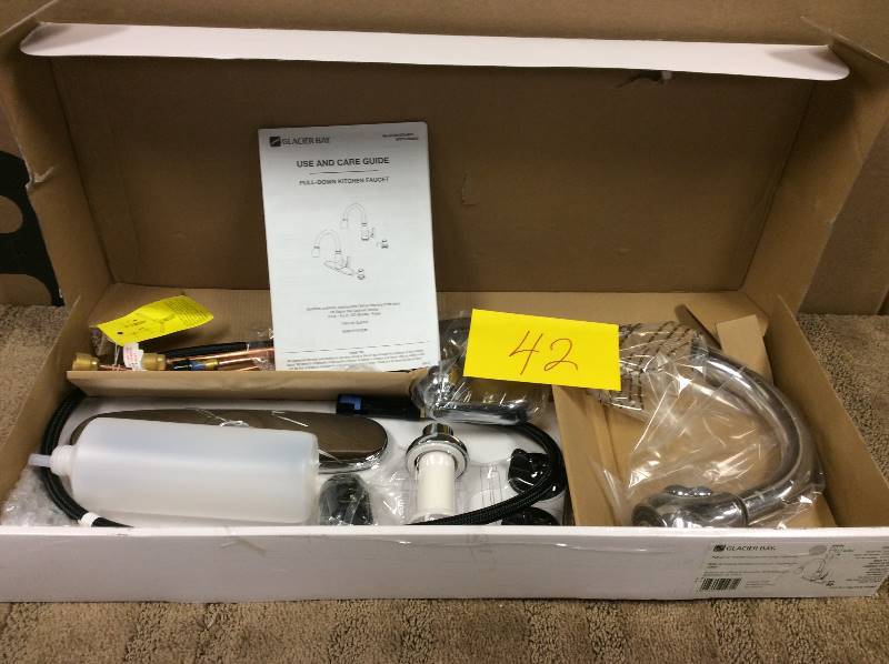 lot 42 image: Builders 2-Handle Standard Kitchen Faucet with Sprayer in Stainless Steel