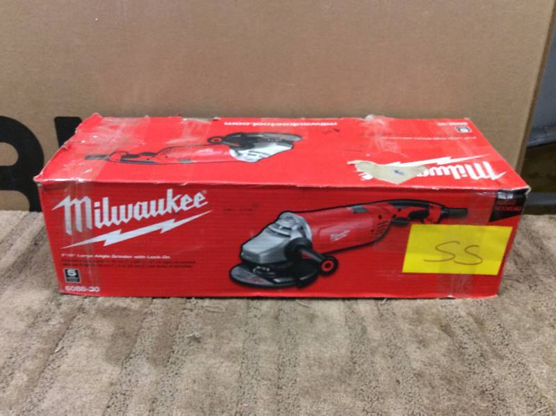 lot 55 image: Milwaukee 15 Amp 79 in. Large Angle Grinder with Trigger Lock-On Switch not used