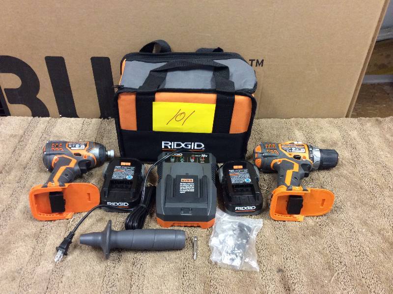 lot 101 image: Ridgid X4 18V Li-Ion Cordless Drill and Impact Driver Combo Kit (R9602) not used