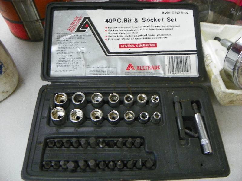 lot 243 image: Nails, sawhorse brackets, socket set, gauge