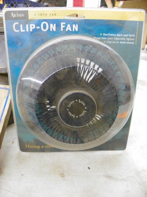 lot 246 image: Welding helmets, clip on fan, cloth utility roll