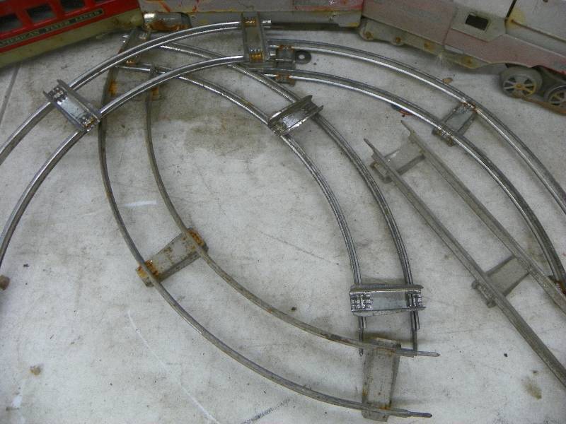 lot 256 image: Old tin toy train and track, American Flyer Lines