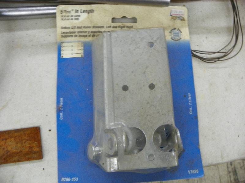 lot 270 image: Belts, bat, hard hat, wheels, wire, wooden clamp, caster wheels
