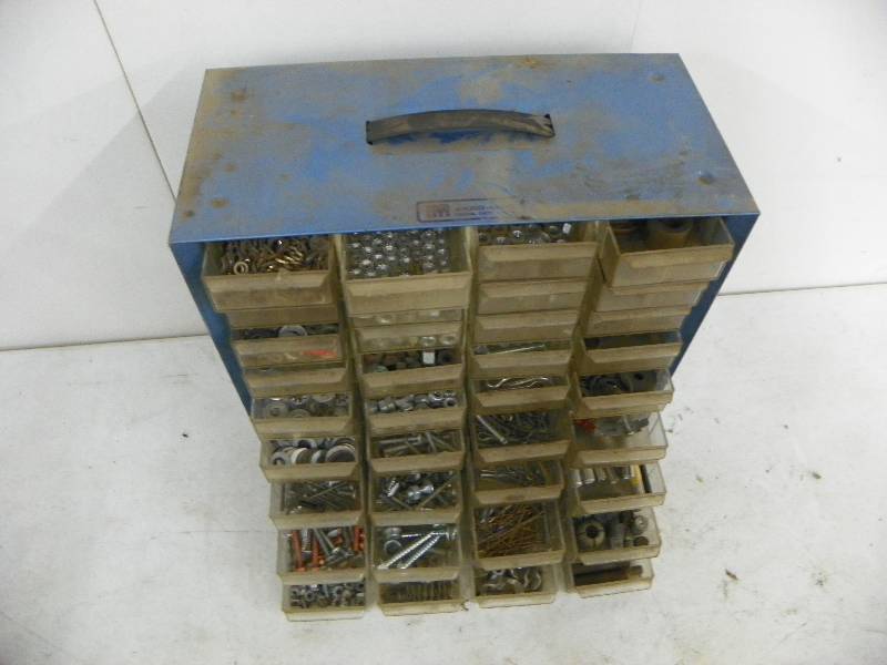 lot 435 image: Storage caddy with nuts and bolts