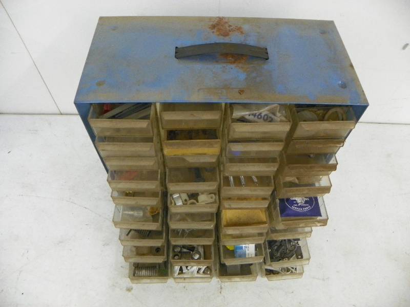 lot 436 image: Storage caddy with misc items