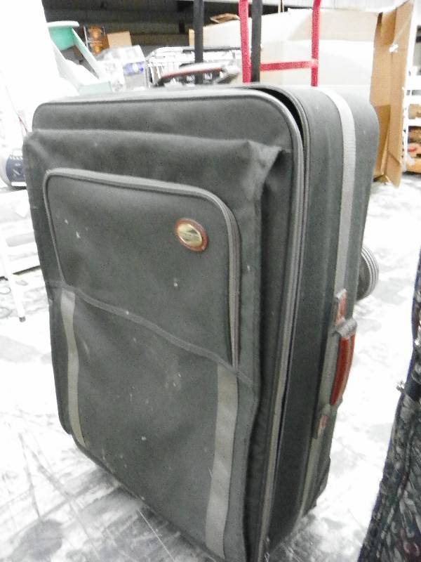 lot 525 image: Two travel suitcases