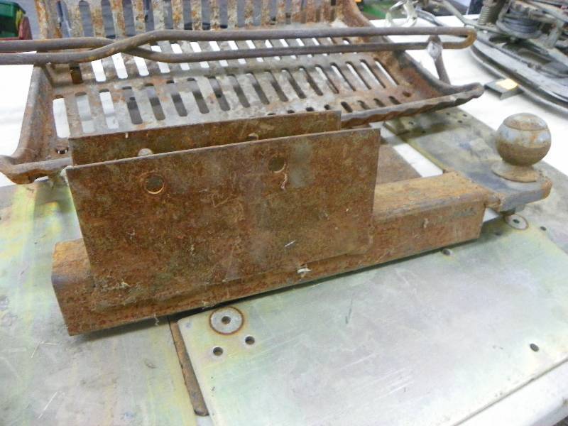lot 547 image: Fire pit grate, hitch and metal plates
