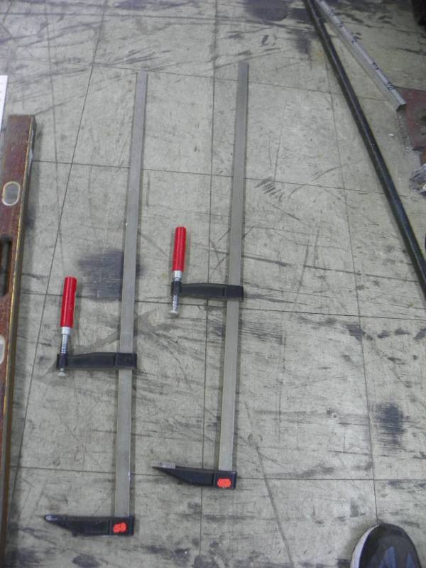 lot 594 image: Bar clamps, T square and level