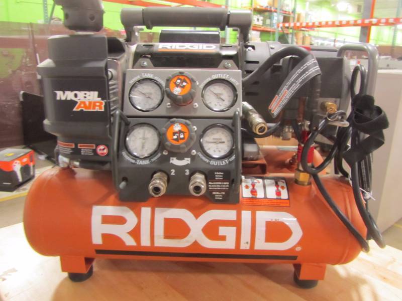 lot 28 image: Ridgid tri-stack 5 gallon compressor and pneumatic job max combo kit