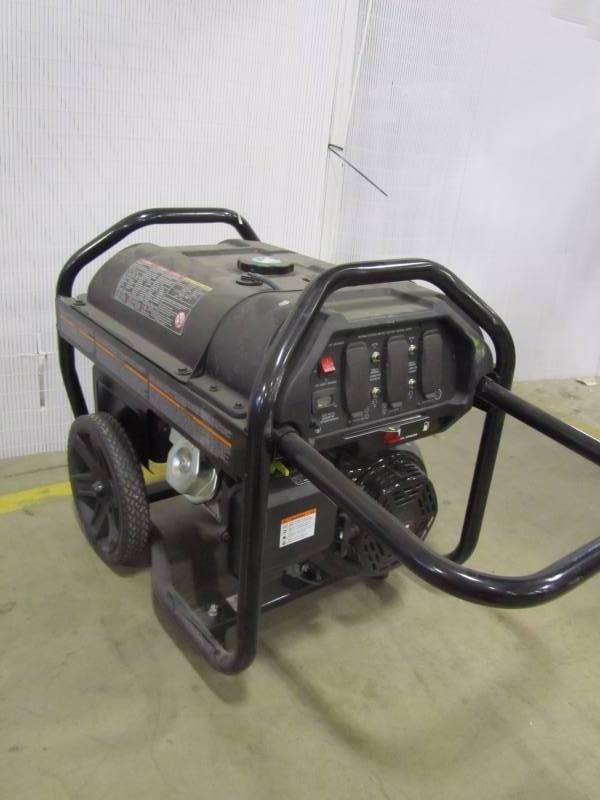 lot 50 image: Powermate 6000 watt gas powered manual start portable generator