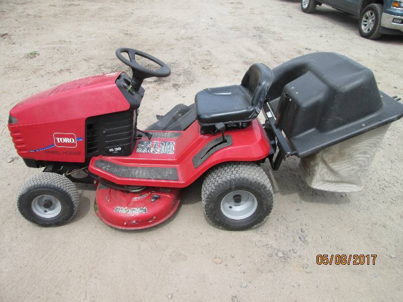 lot 1 image: Toro Wheel Horse Lawn Tractor