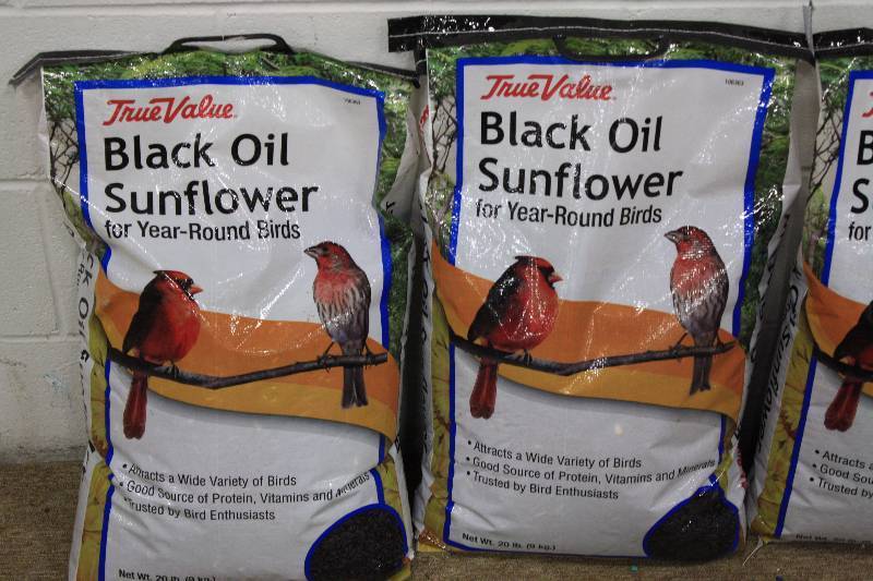 lot 26 image: 4 Black Oil Sunflower 20lb Bird Seed Bags
