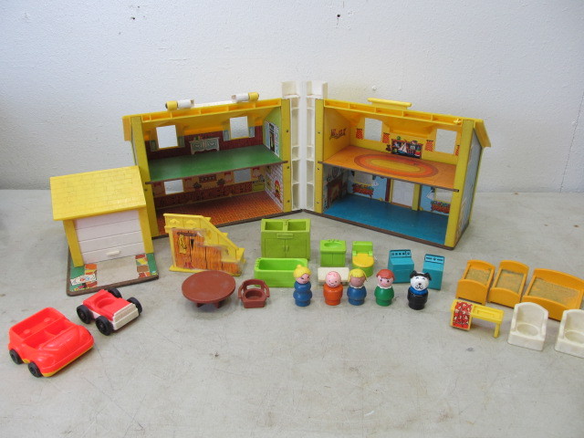 lot 75 image: Vintage Fisher Price Play Family House LOADED