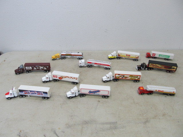 lot 93 image: Collection of Diecast Advertising Semi Trucks